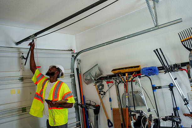 Professional Garage Door Panel Replacement technician working in Perry, IA